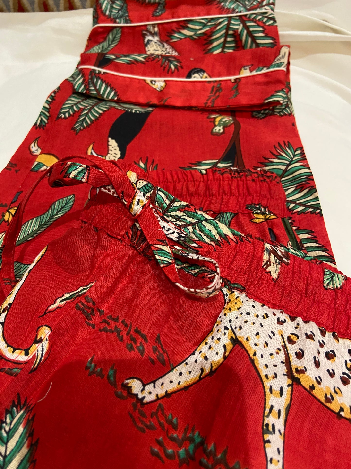red pyjamas, Safari Cotton pyjamas for women. Bright Crimson cotton printed with a fabulous safari theme. Zebra, Monkeys, leopards and parrots. colourful pyjamas, pyjama set for women, patterned pyjamas for women, ladies pyjama, womens nightwear, womens sleepwear, cotton pyjamas, colourful pyjamas for women, colourful womens sleepwear, cotton pyjama set, 100% cotton, cotton pjs, womens PJs