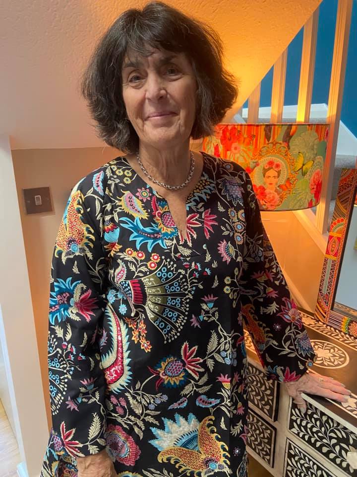 Stunning and vibrant jungle flower rose pattern pyjamas with black background. Long length pyjama top with long sleeves and no buttons for style and comfort. Pyjamas for women to sleep or lounge in luxury. Available in 3 sizes - Medium, Large and Extra Lagre. Beautifully soft 100% Cotton Long Length Top Comes with cute matching bag.