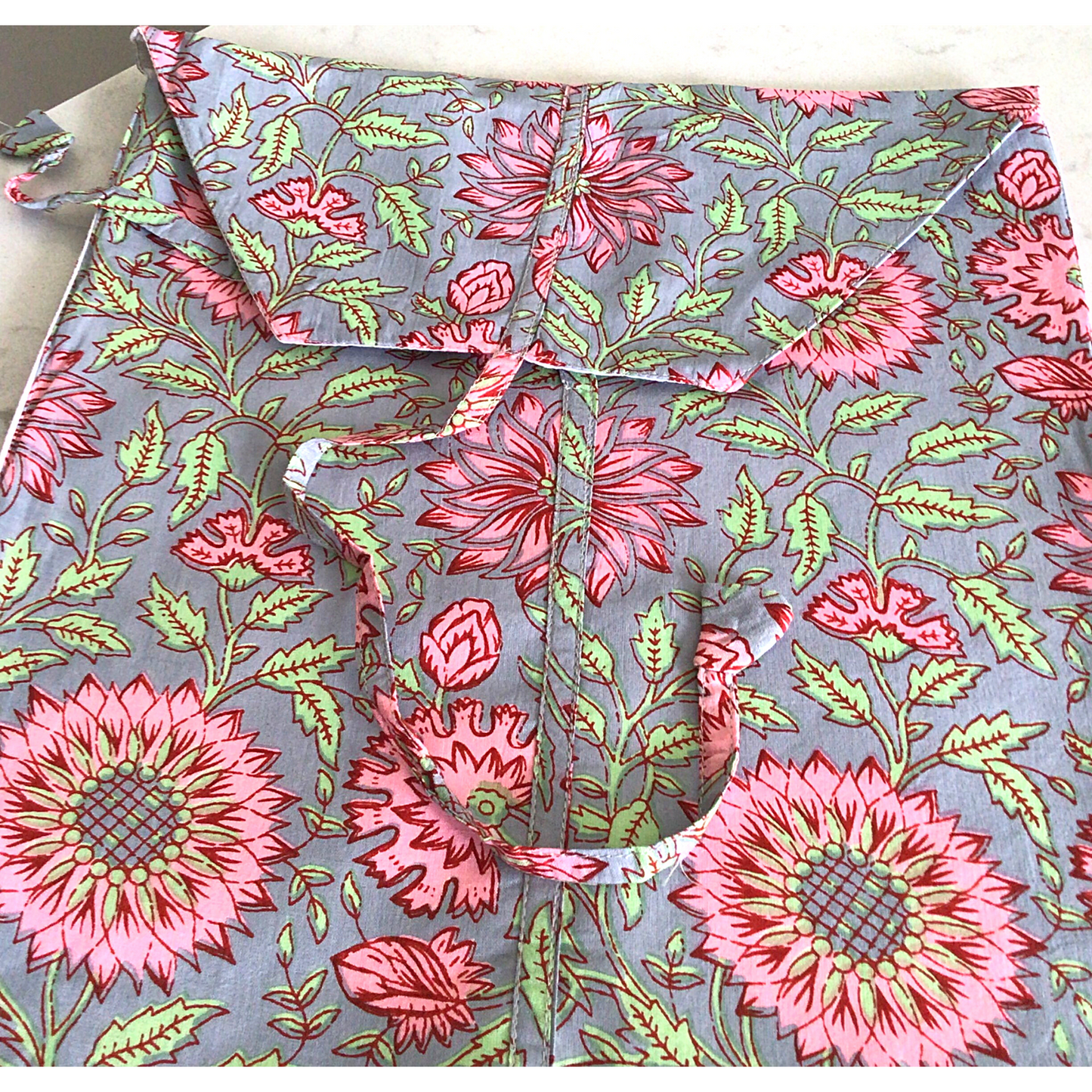 Grey and pink shorts pyjamas for women, grey pj shorts, Luxury loungewear, 100% fine cotton pjs. Floral design in grey and pink on 100% cotton, ladies pyjamas, Classic pyjama styling. Short sleeves and shorts with Elasticated waist. Presented in a beautiful cloth gift bag, nightwear made from hand-printed cotton.