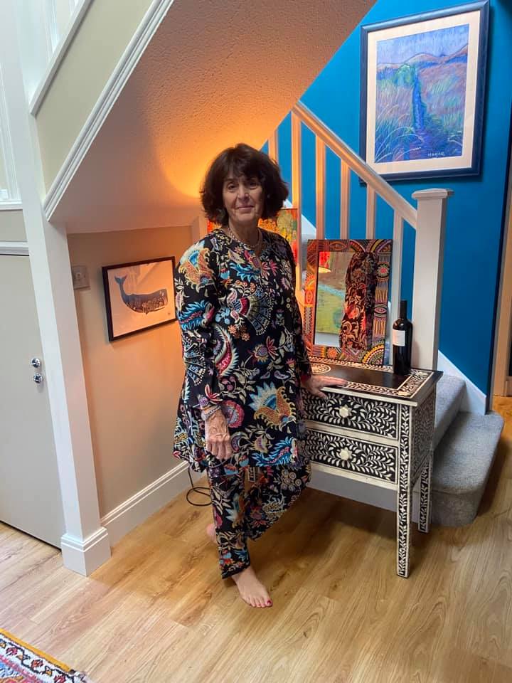 Stunning and vibrant jungle flower rose pattern pyjamas with black background. Long length pyjama top with long sleeves and no buttons for style and comfort. Pyjamas for women to sleep or lounge in luxury.  Available in 3 sizes - Medium, Large and Extra Lagre. Beautifully soft 100% Cotton Long Length Top Comes with cute matching bag. 