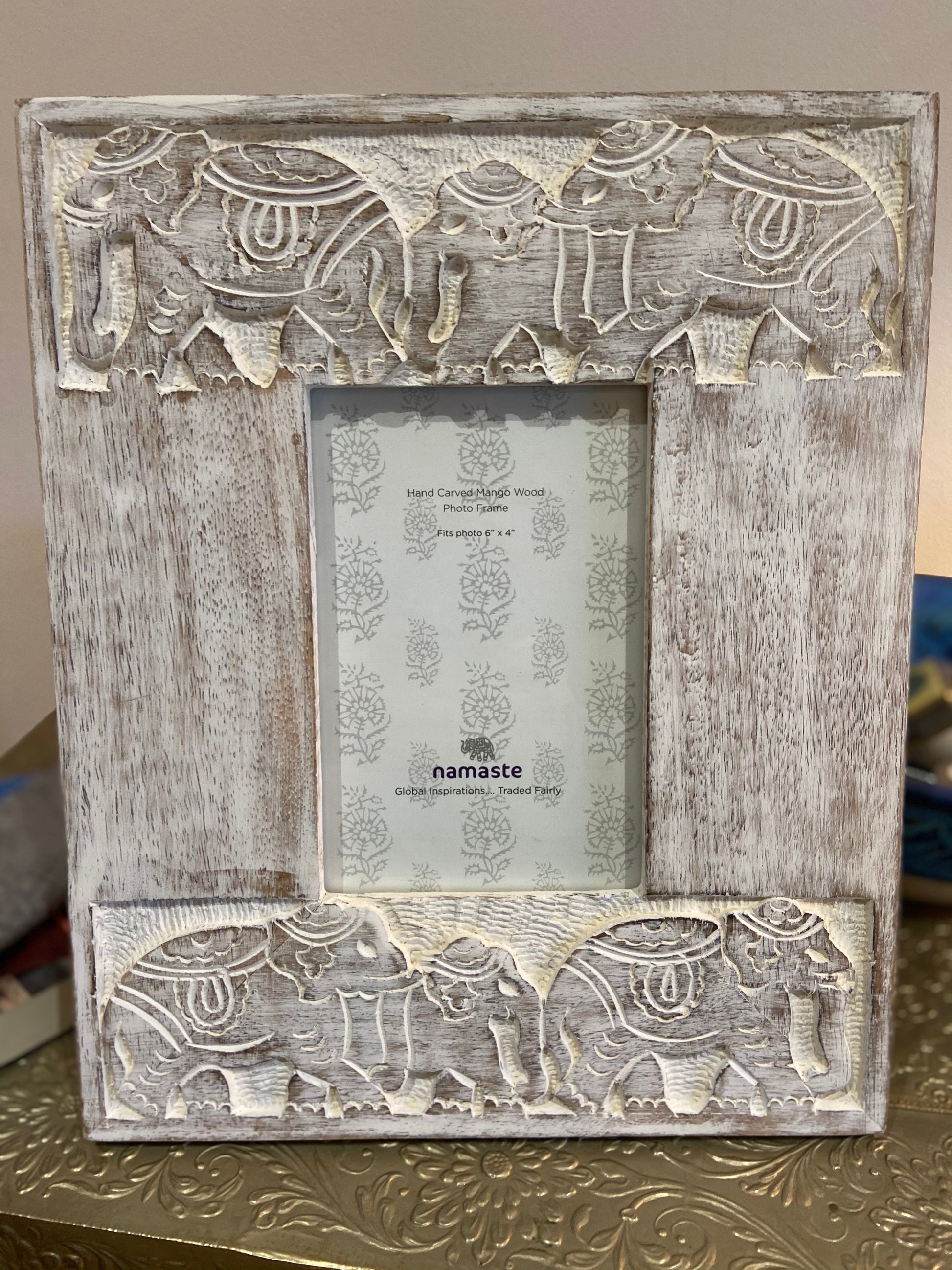 Photo frame made from Mango wood in India. Gentle white washed and beautiful carved elephant design. Size - 28 x 23cm, decorative photo frame, white photo frame, white photo frame with elephants on, photo frame for the home, white washed frame for photos, Mango wood phot frame, medium size photo frame